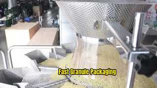 Granule packing machine with multi head weigher